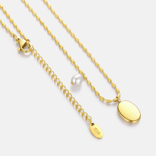 SUSPENDED PEARL TEARDROPS